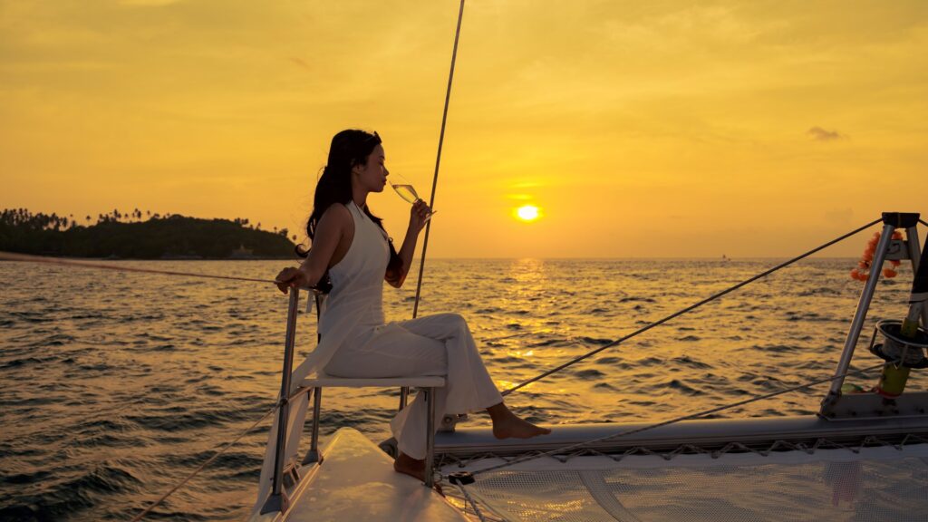 Phang Nga Private Charter Guest enjoying a luxury Phuket catamaran sunset cruise with 109 Thailand Travel
