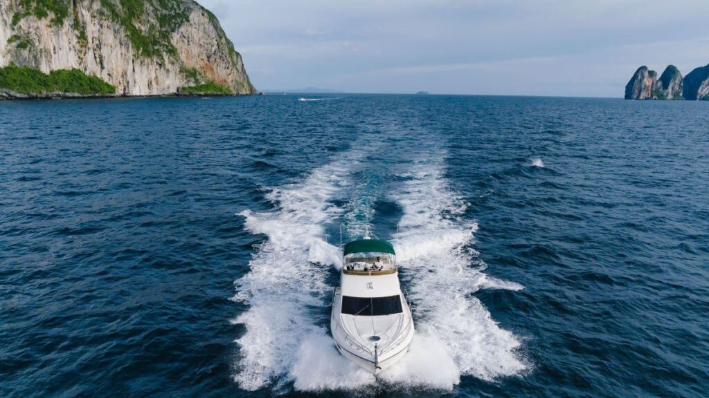 Private speed boat charter cruising near Phi Phi Island Phuket by 109 Thailand Travel